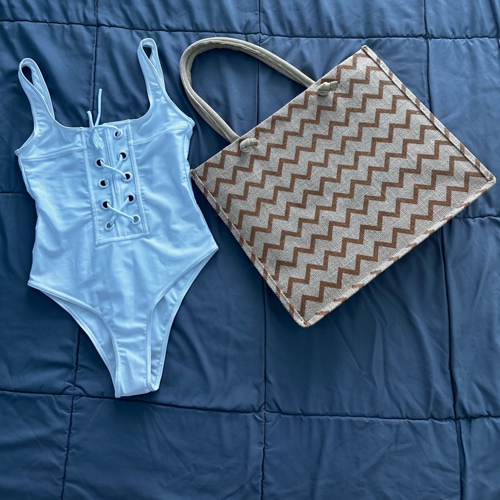 White swimsuit and waterproof bag.